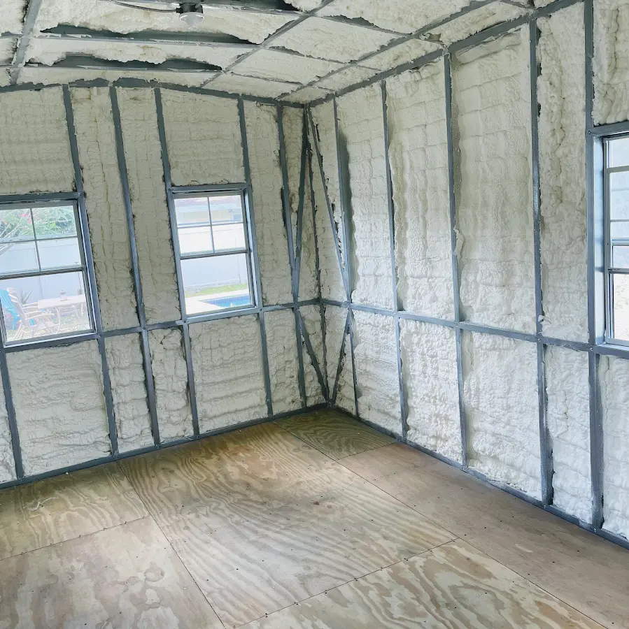 Closed-cell spray foam insulation applied to wall cavities in a residential project in Morehead City